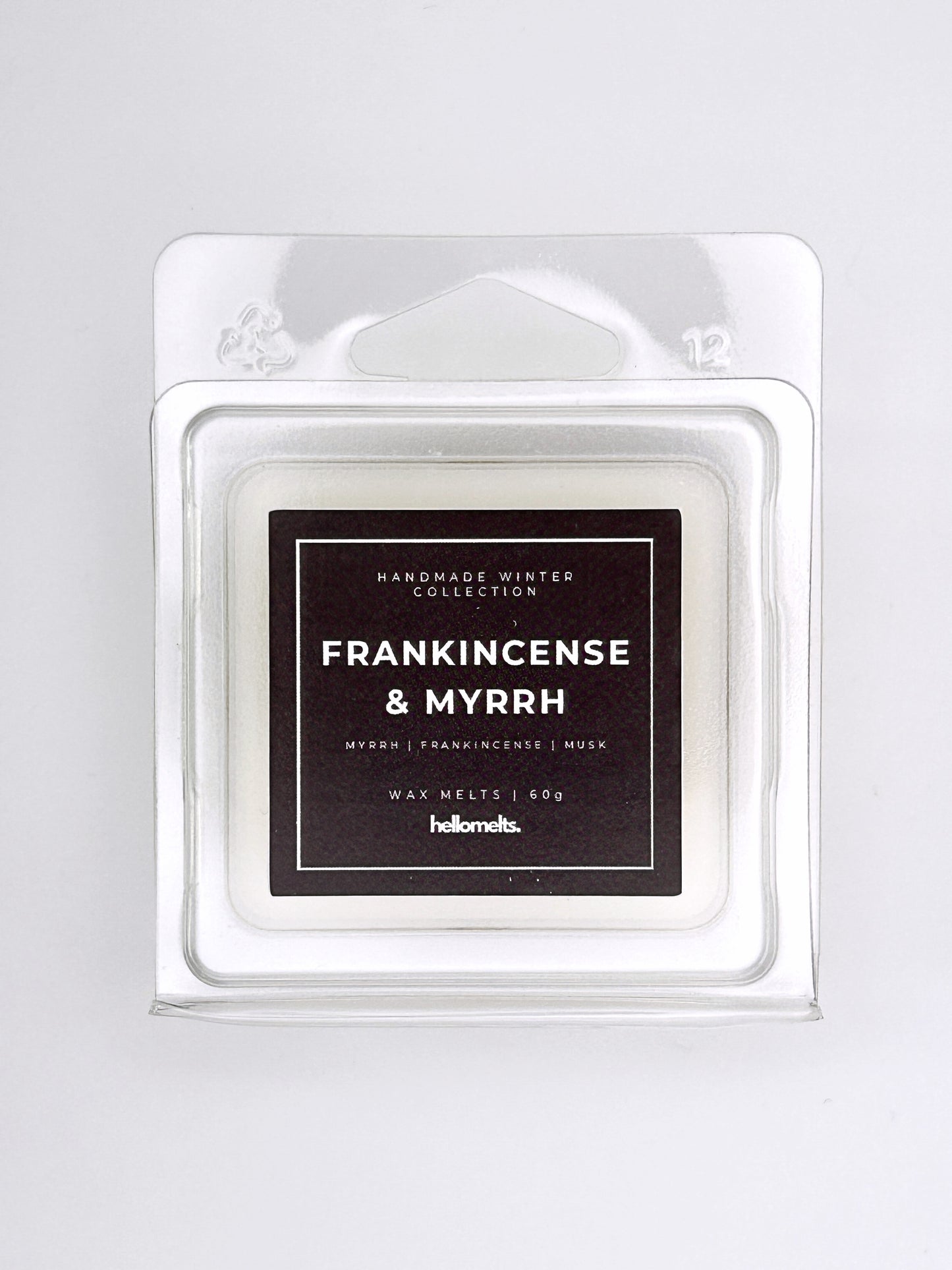 Frankincense & Myrrh 60g wax melt label close-up on the clamshell packaging from the Hellomelts Winter Collection