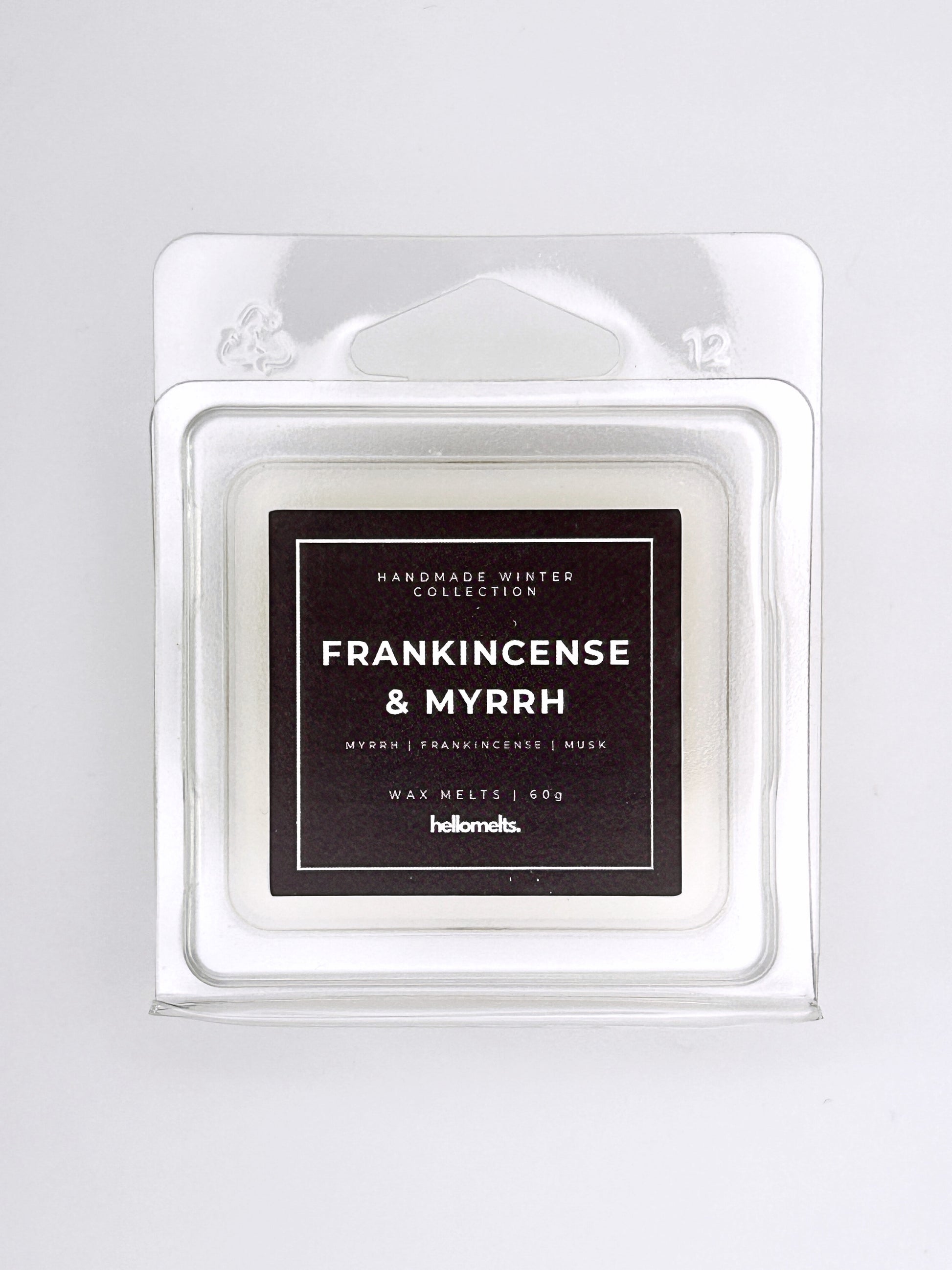 Frankincense & Myrrh 60g wax melt label close-up on the clamshell packaging from the Hellomelts Winter Collection
