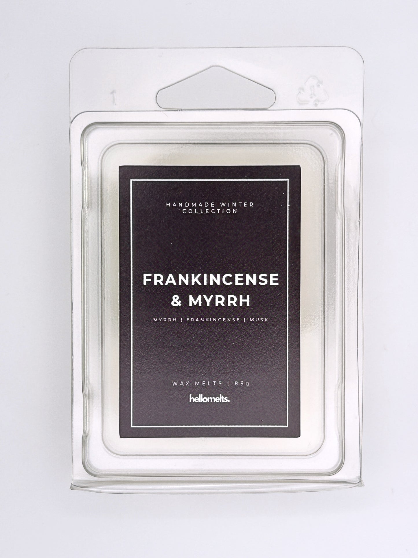 Frankincense & Myrrh 85g wax melt label close-up on the clamshell packaging from the Hellomelts Winter Collection