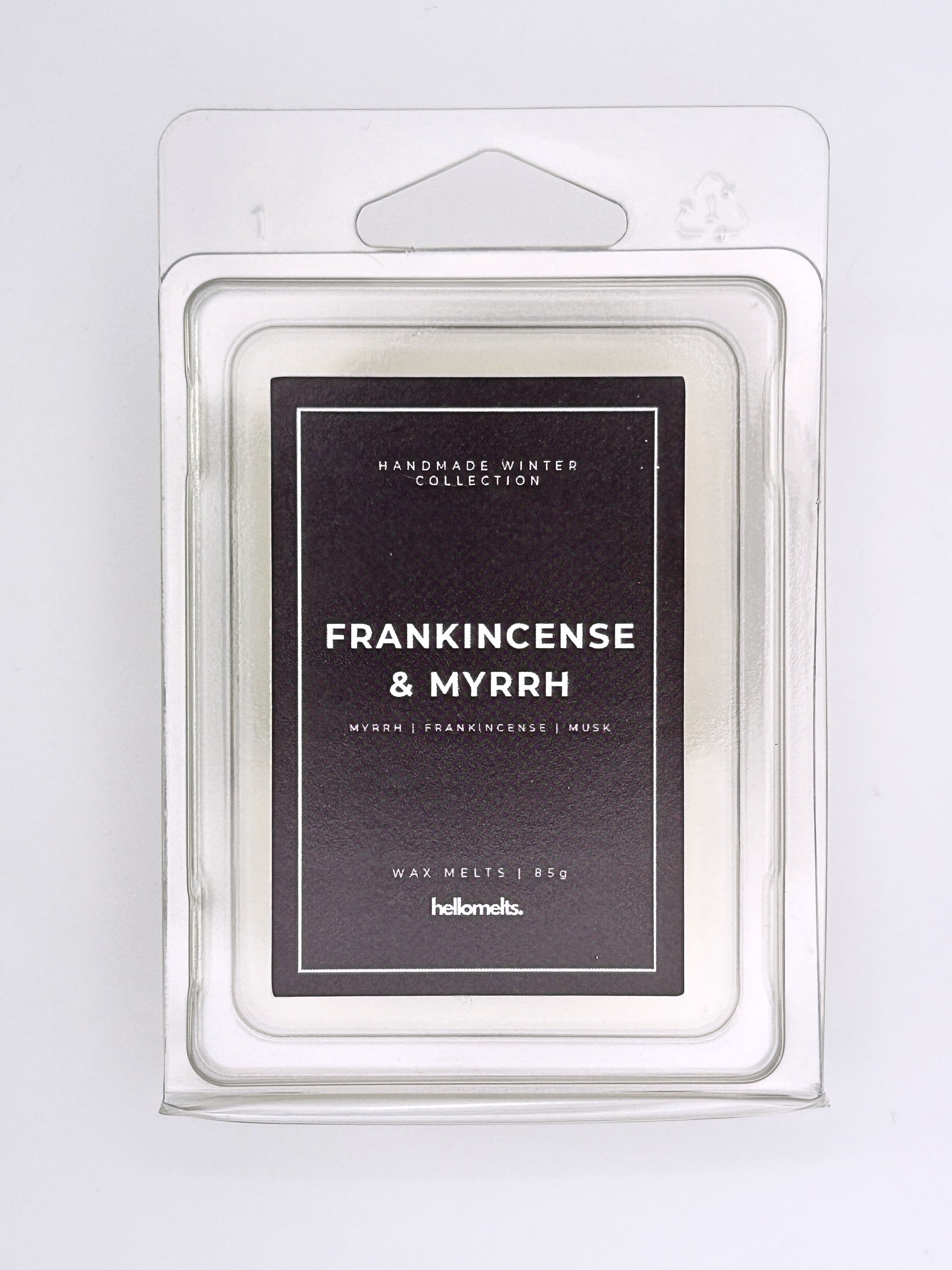 Frankincense & Myrrh 85g wax melt label close-up on the clamshell packaging from the Hellomelts Winter Collection