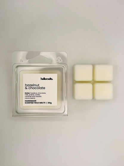 Hazelnut & Chocolate 60g wax melt bar displayed beside its clear clamshell packaging from the Hellomelts Autumn Collection