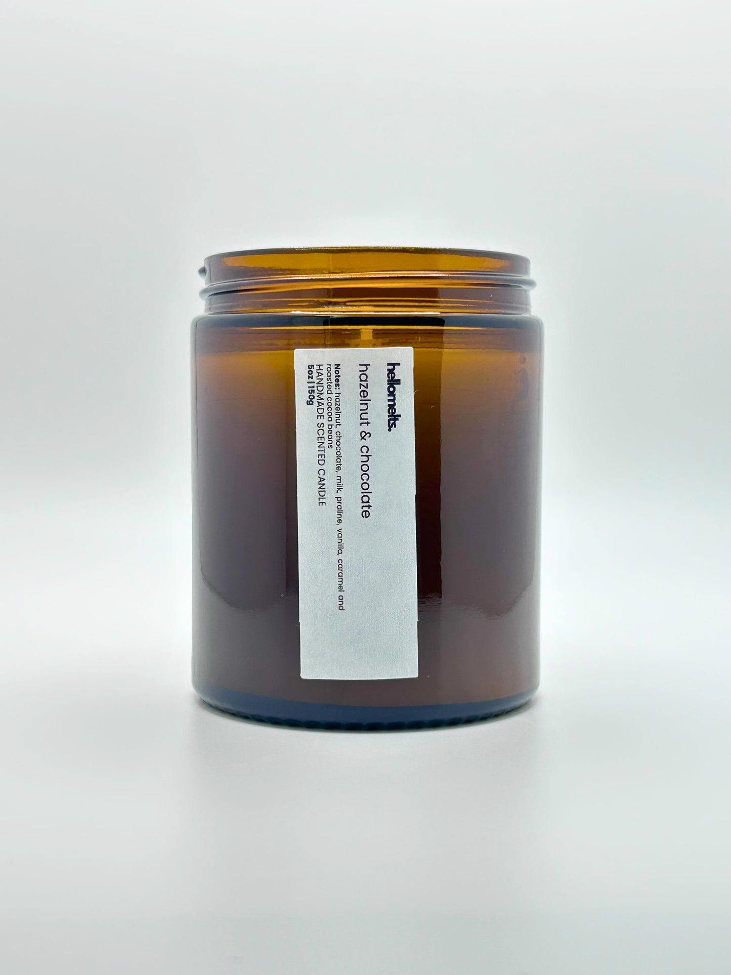 Front view of Hazelnut & Chocolate autumn scented candle by Hellomelts with the lid off, part of the Autumn Collection