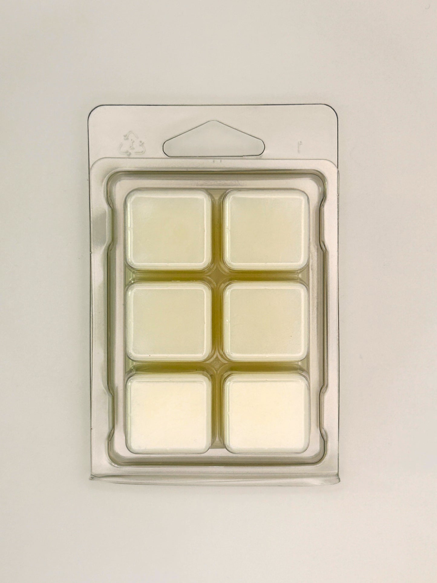 Back of Hazelnut & Chocolate 85g wax melt clamshell packaging showing the wax inside from the Hellomelts Autumn Collection