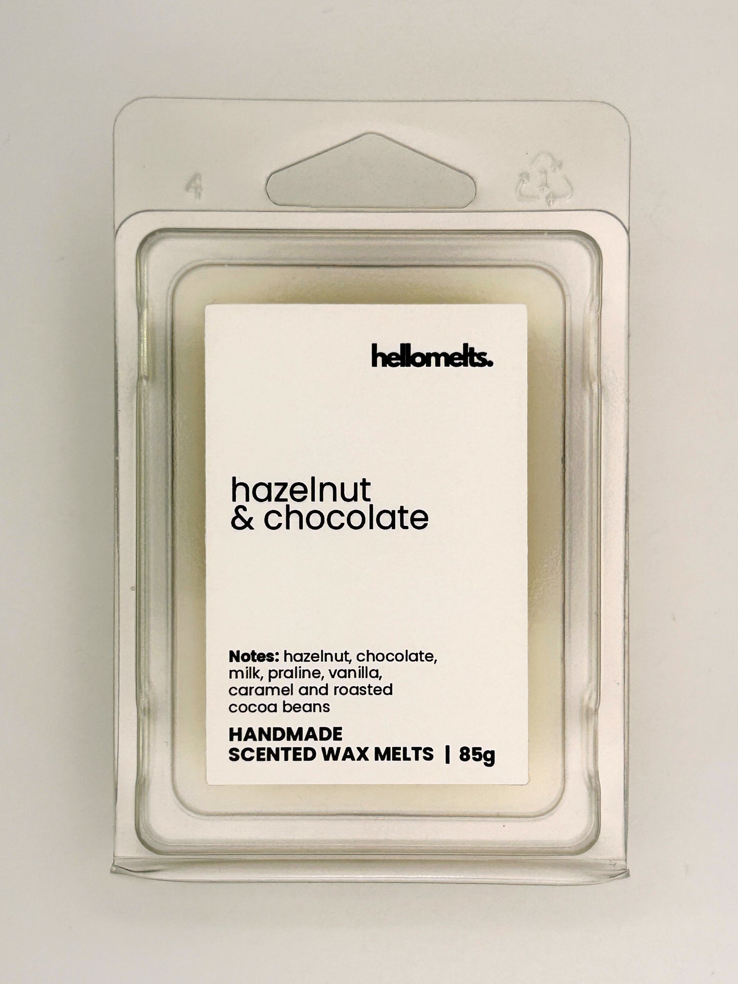 Close up of Hazelnut & Chocolate 85g wax melt label on clear clamshell packaging from the Hellomelts Autumn Collection