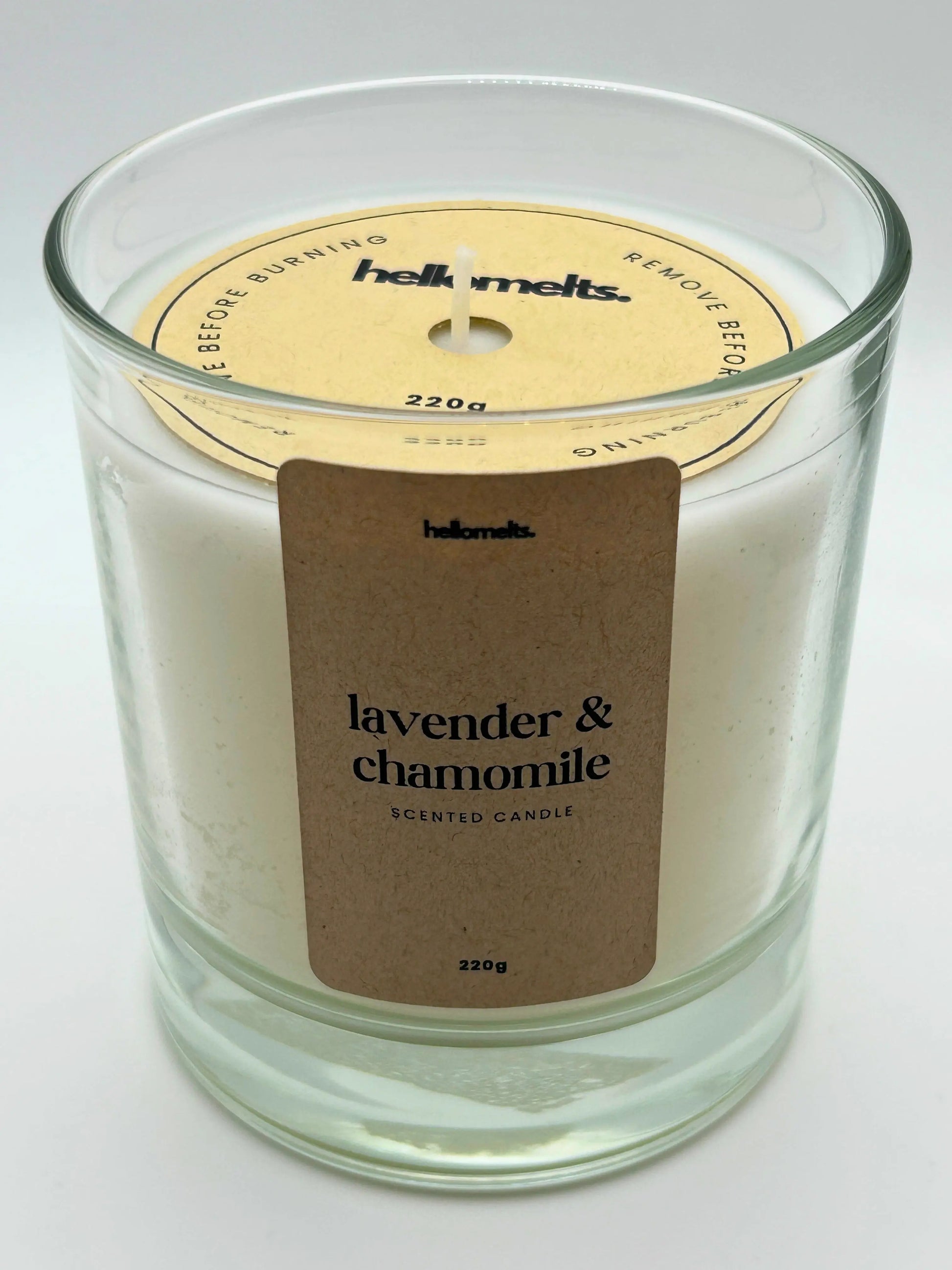 Angled front view of the Lavender & Chamomile candle with the branded cardboard wick cover on, from the Hellomelts Spring Collection.