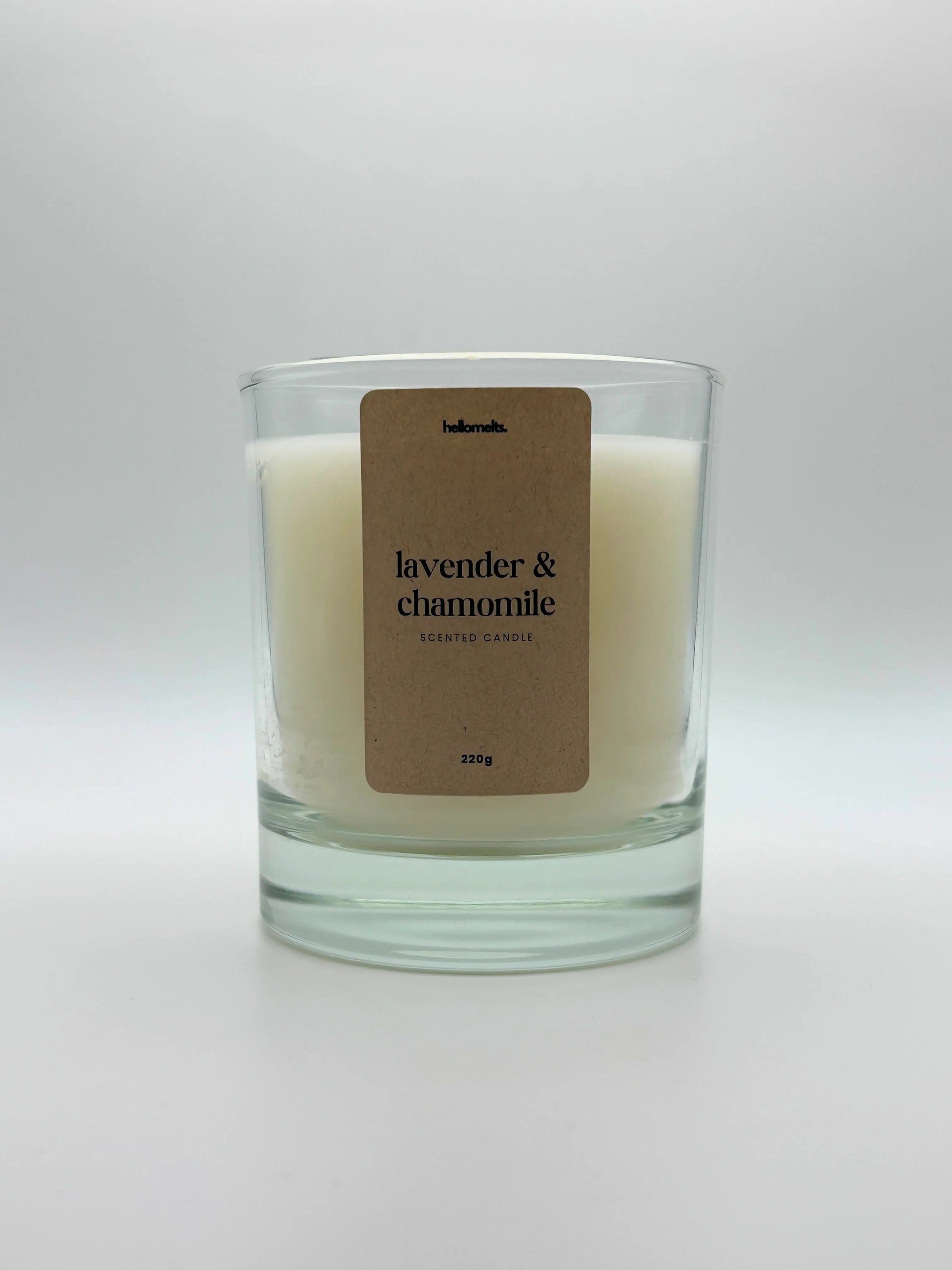 Front view of Lavender & Chamomile scented candle by Hellomelts, featuring a clean white wax in a clear glass jar, part of the Spring Collection.