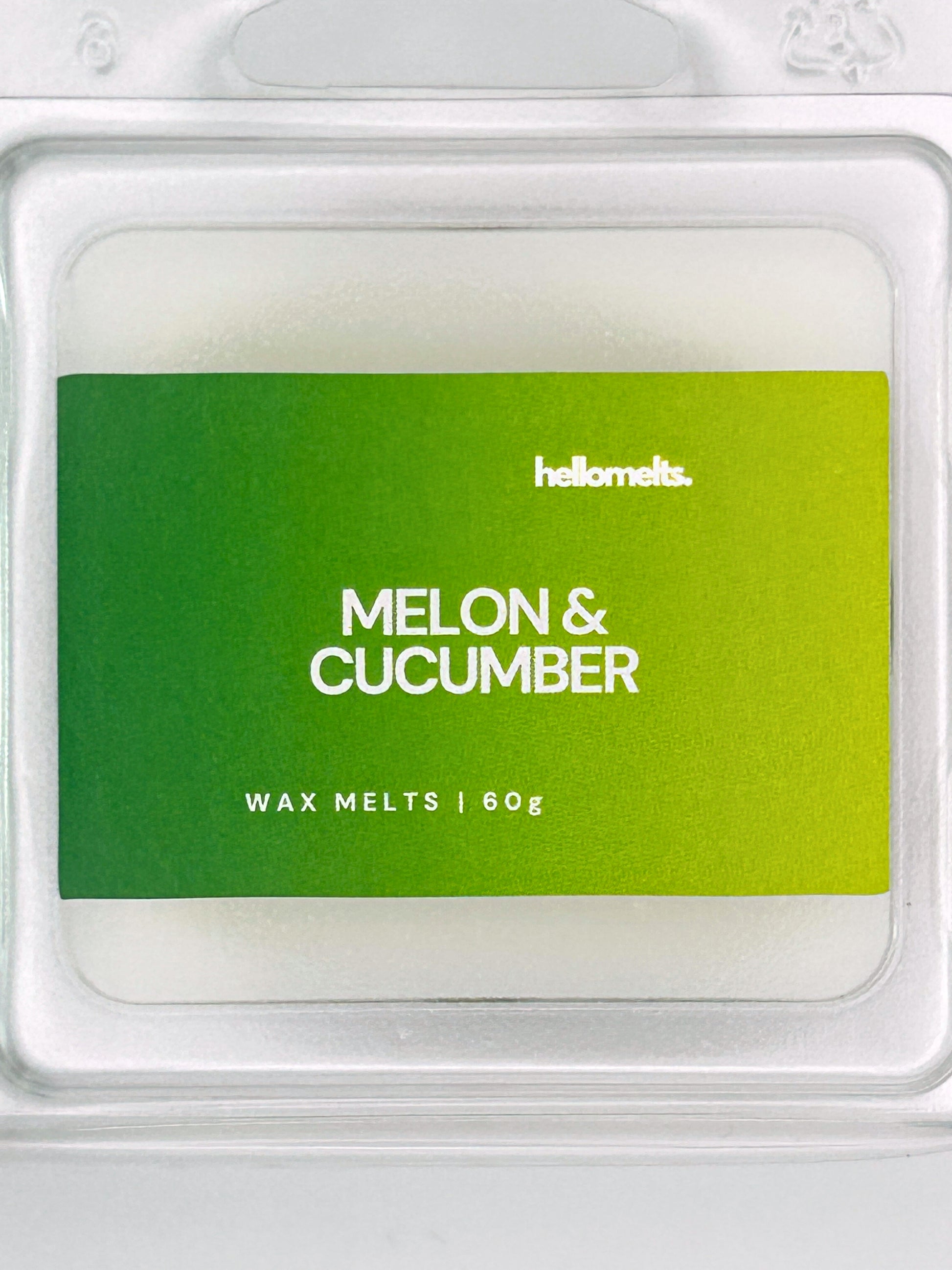 Close-up of the Melon & Cucumber 60g wax melt label, showing detailed Hellomelts branding and summer scent design