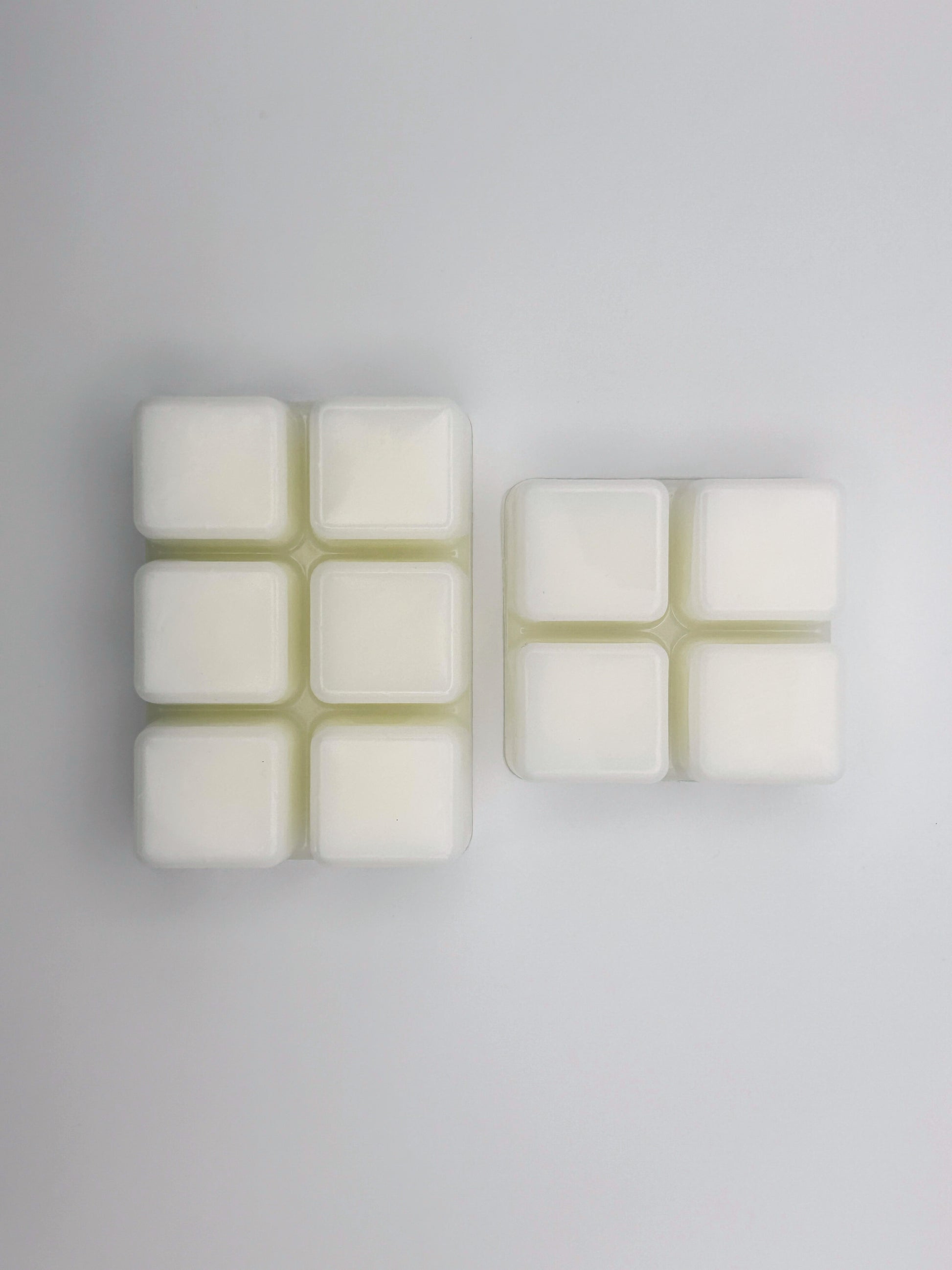 Size comparison of Melon & Cucumber wax melts, showing 85g and 60g bars side by side from the Hellomelts Summer Collection