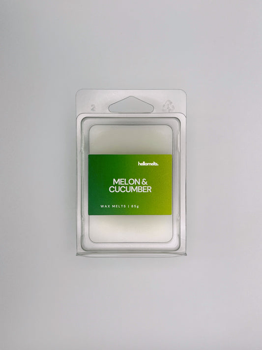 Flatlay of Melon & Cucumber 85g wax melt bar by Hellomelts, part of the Summer Collection with fresh, vibrant colour tones