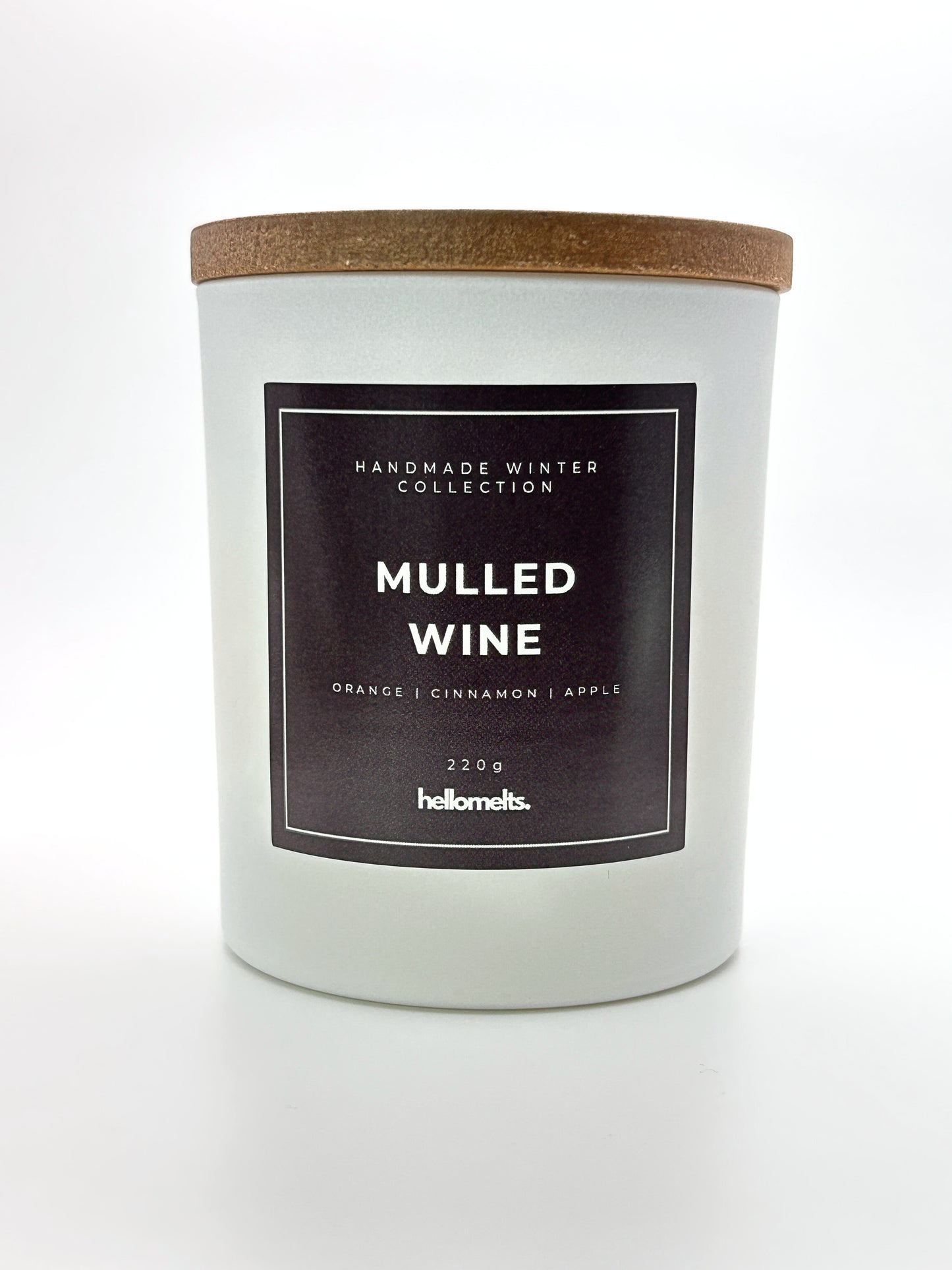 Mulled Wine 220g candle front-facing studio shot with wooden lid on, part of the Hellomelts Winter Collection