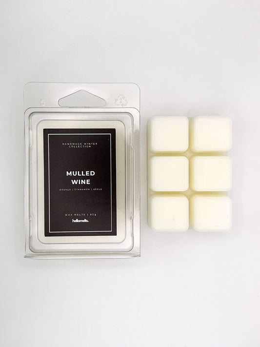 Mulled Wine 85g wax melt clamshell placed beside six wax cubes from the Hellomelts Winter Collection