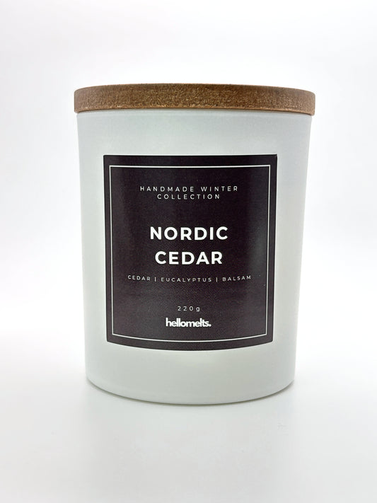 Nordic Cedar 220g candle front-facing studio shot with wooden lid on, part of the Hellomelts Winter Collection