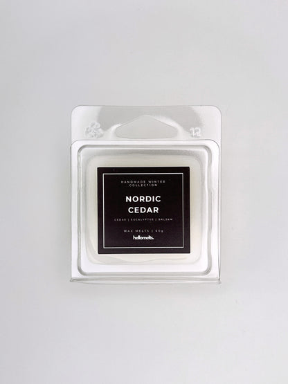 Nordic Cedar 60g wax melt front-facing studio shot showing the clamshell packaging from the Hellomelts Winter Collection