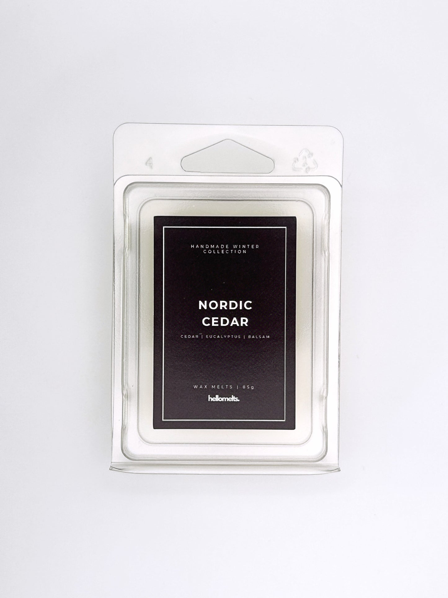 Nordic Cedar 85g wax melt front-facing studio shot showing the clamshell packaging from the Hellomelts Winter Collection