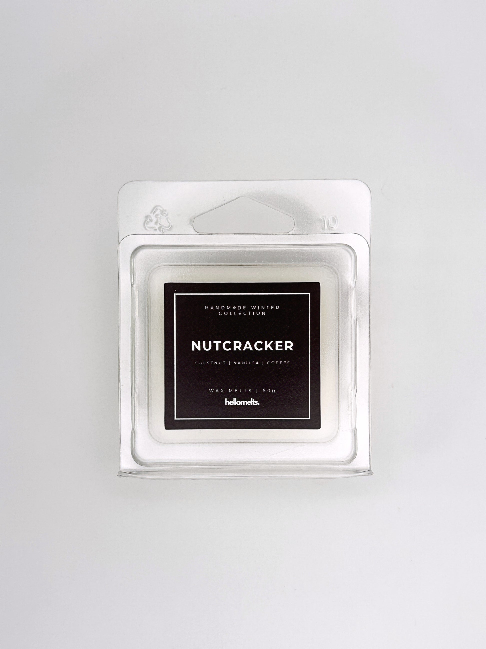 Nutcracker 60g wax melt front-facing studio shot showing the clamshell packaging from the Hellomelts Winter Collection