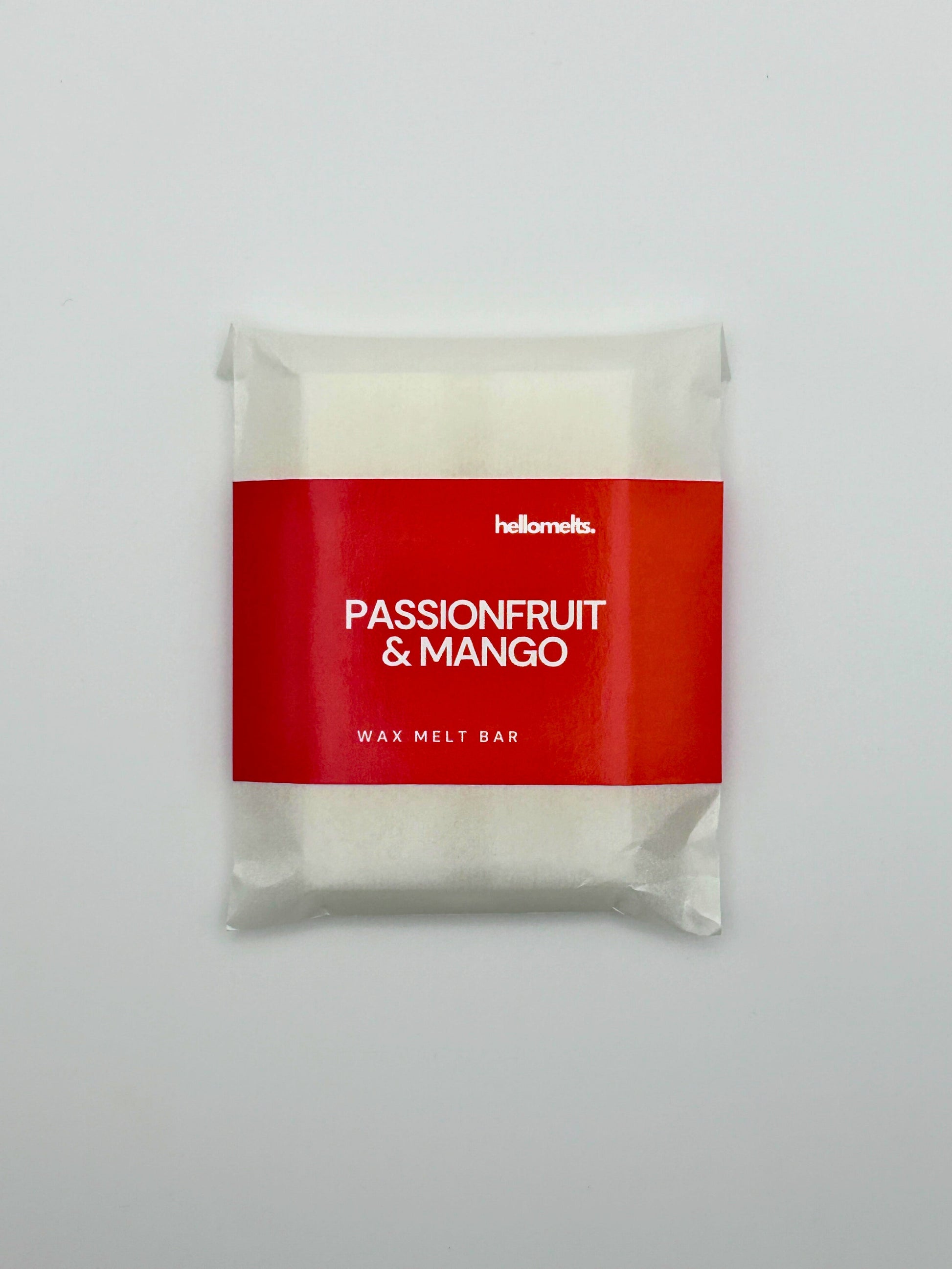 Flatlay top-down view of the Passionfruit & Mango 30g wax melt bar by Hellomelts from the Summer Collection.