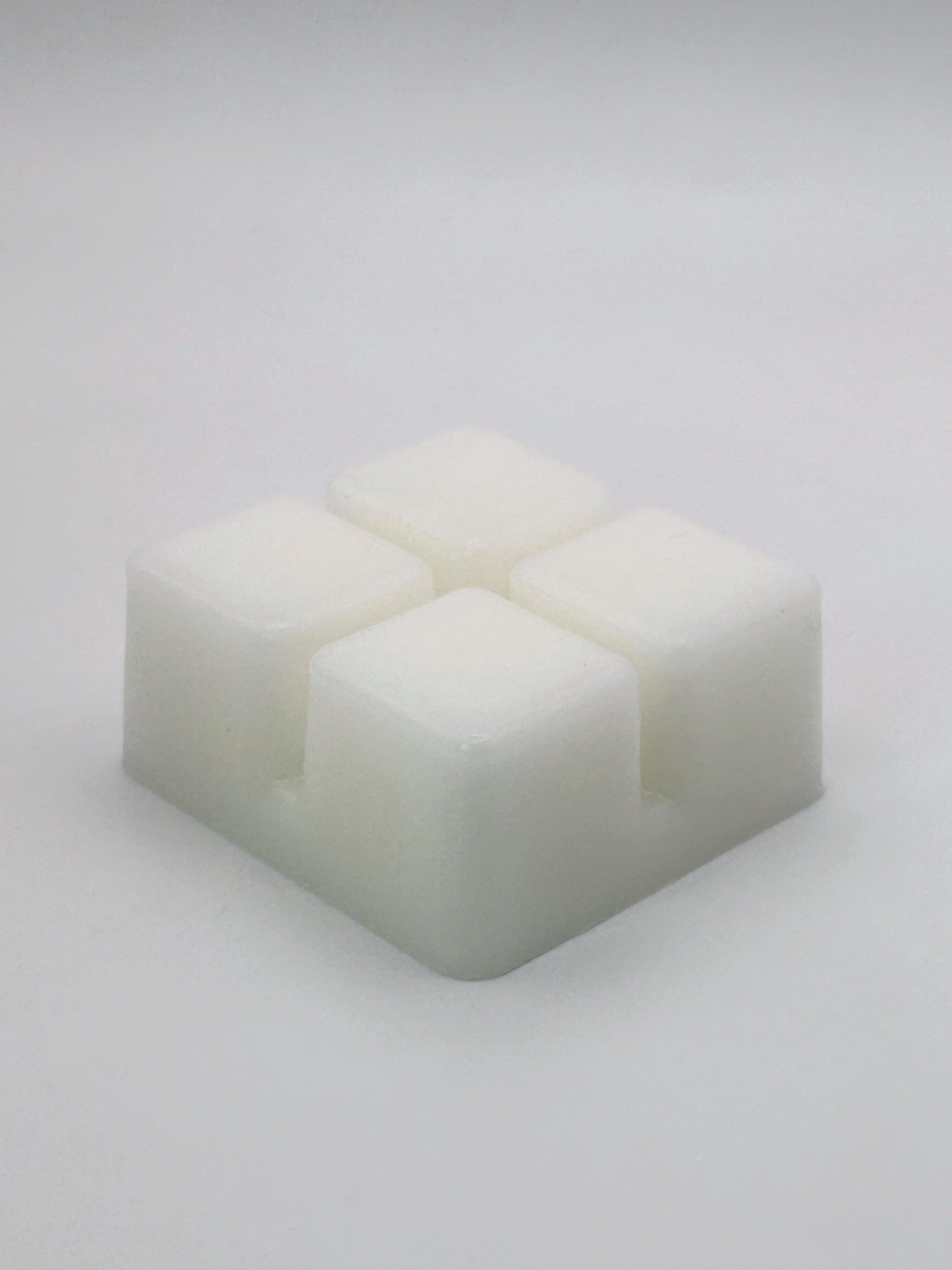 Angled view of Passionfruit & Mango 60g wax melt bar by Hellomelts, highlighting 4 cubed bar design