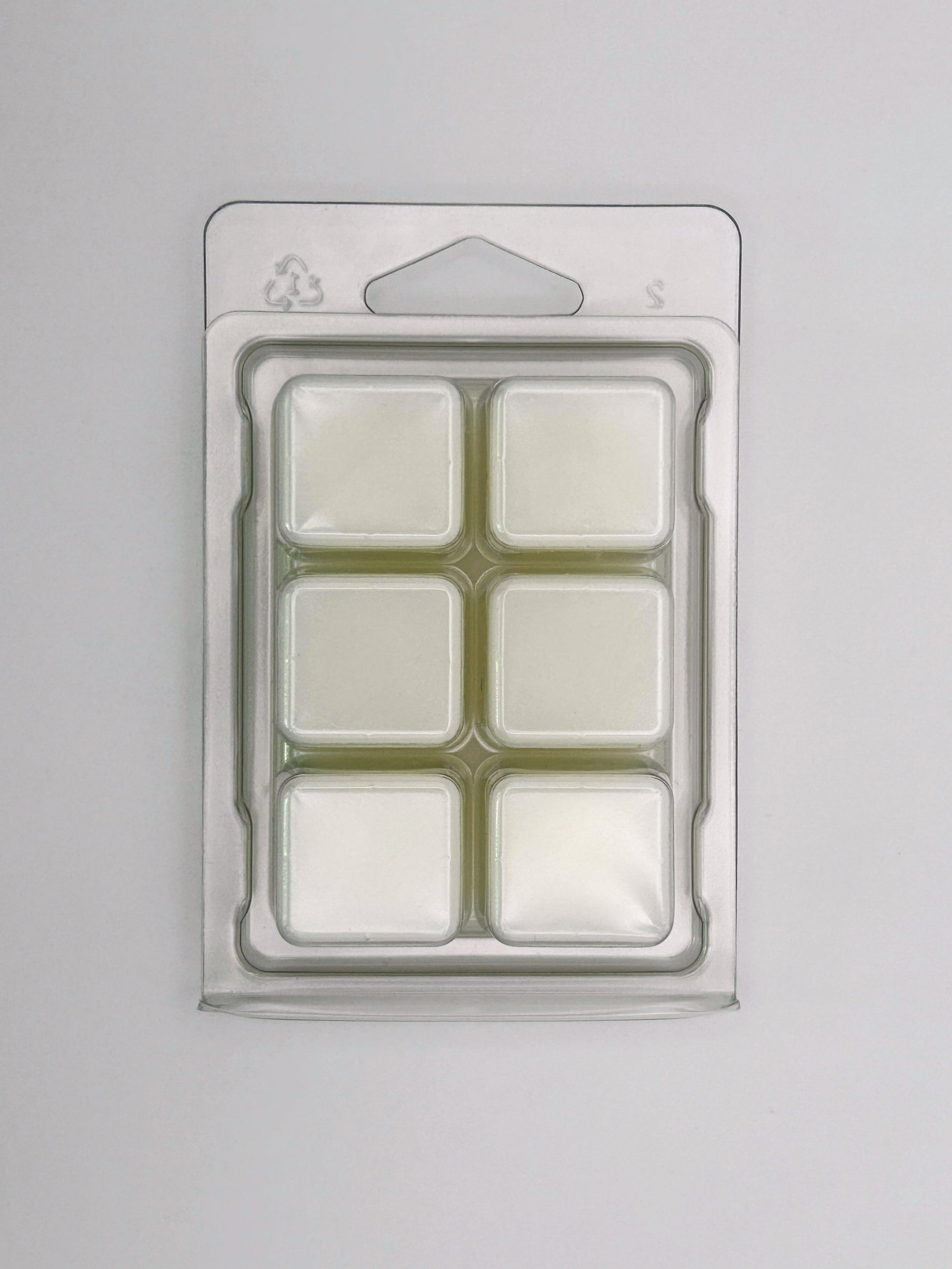Back view of the Passionfruit & Mango 85g wax melt packaging, showing cubed bar design