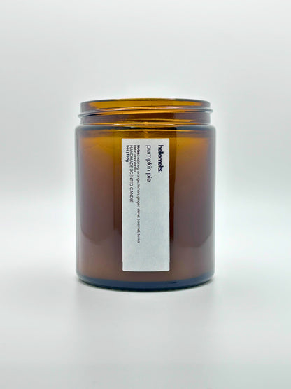Front view of Pumpkin Pie autumn scented candle by Hellomelts with the lid off, part of the Autumn Collection