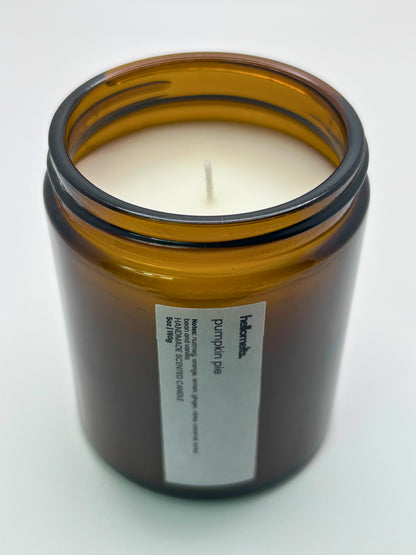 Angled top-down view of Pumpkin Pie autumn candle by Hellomelts, highlighting the wick and hand-poured wax, part of the Autumn Collection