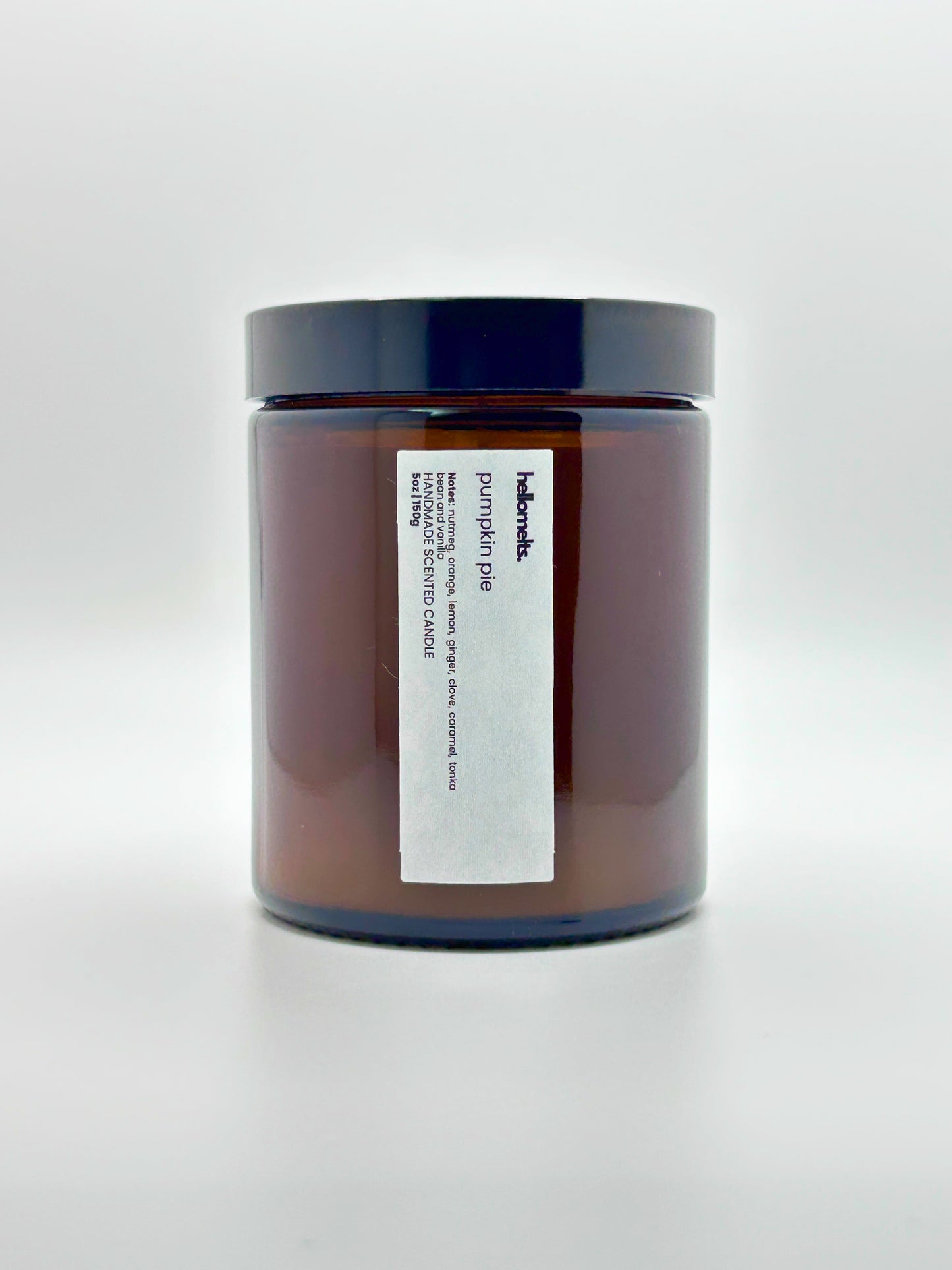 Front view of Pumpkin Pie autumn candle by Hellomelts with the lid on, part of the Autumn Collection