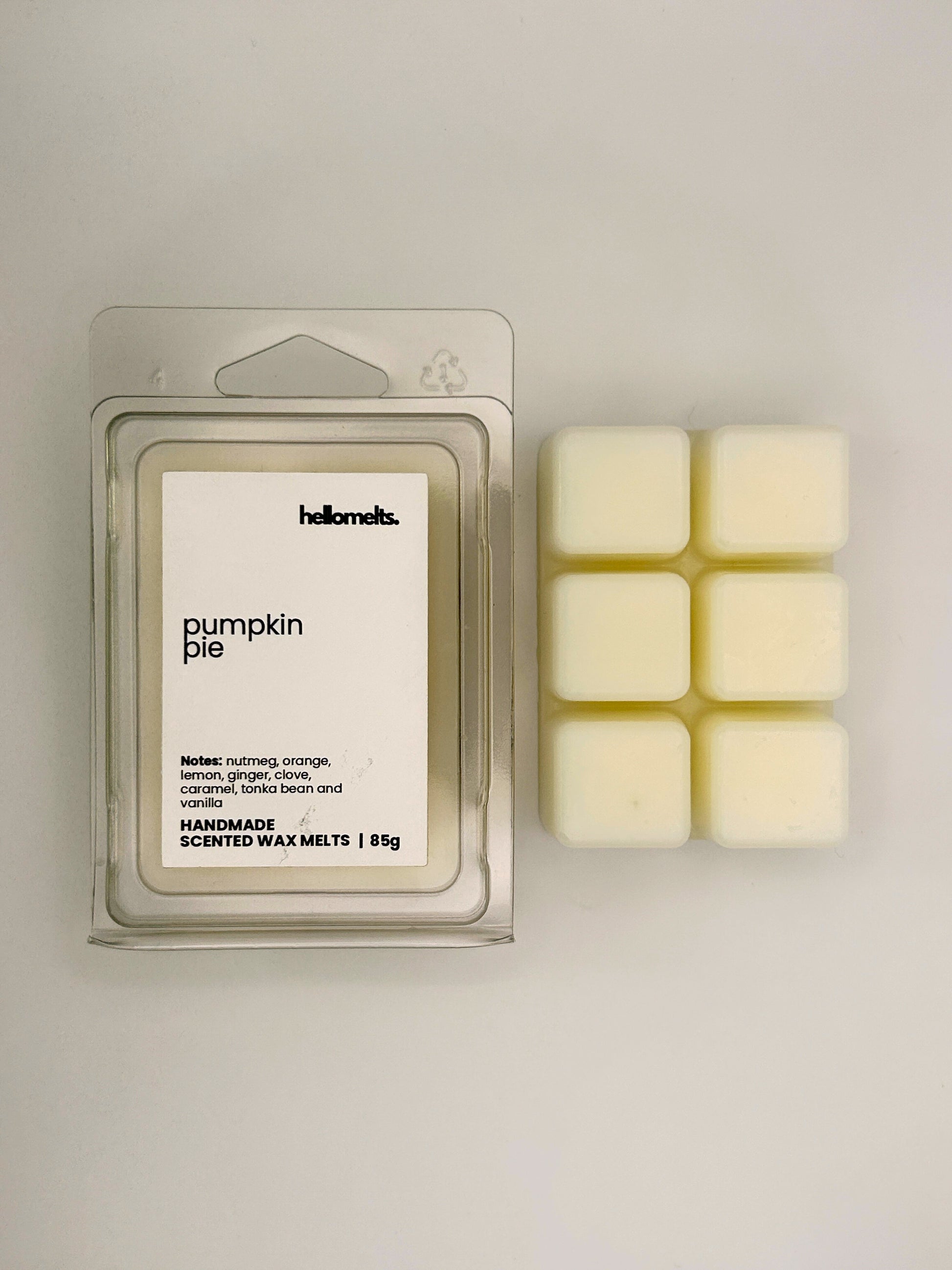 Pumpkin Pie 85g wax melt bar displayed beside its clear clamshell packaging from the Hellomelts Autumn Collection