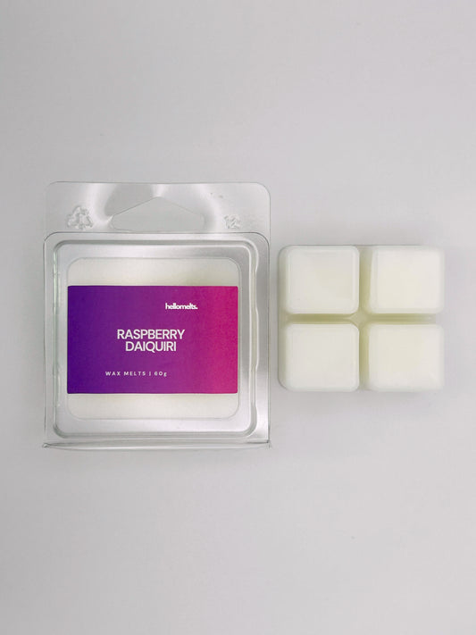 Raspberry Daiquiri 60g wax melt bar by Hellomelts pictured beside its clamshell packaging, part of the Summer Collection