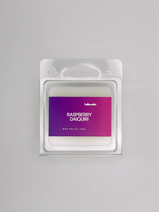 Flatlay of Raspberry Daiquiri 60g wax melt bar by Hellomelts, part of the Summer Collection with vibrant berry colours and summer design