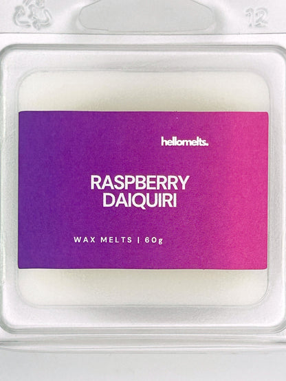 Close-up of the Raspberry Daiquiri 60g wax melt label, showing detailed branding and cocktail-inspired scent design from Hellomelts