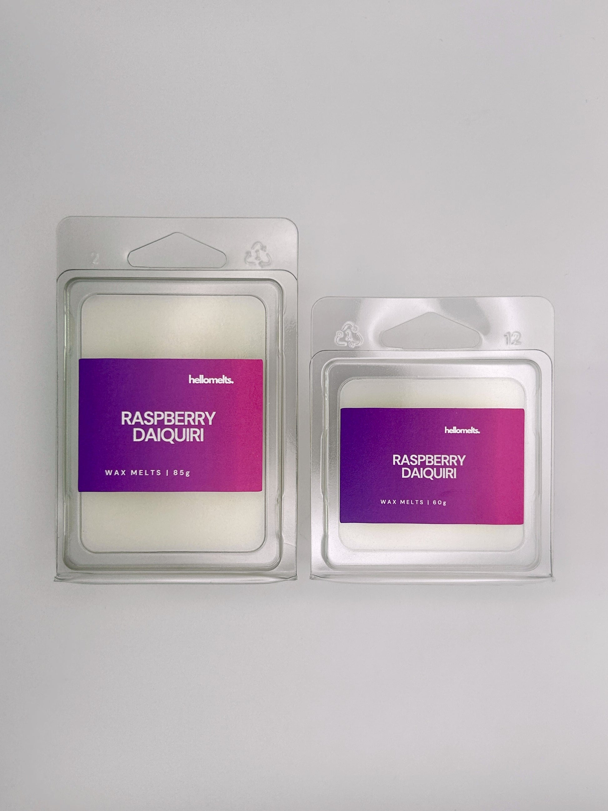Side-by-side view of Hellomelts Raspberry Daiquiri wax melts in both 85g and 60g sizes from the Summer Collection