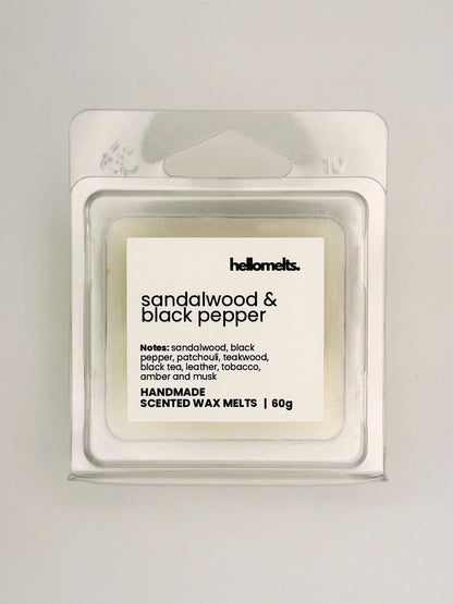 Close up of Sandalwood & Black Pepper 60g wax melt label on clear clamshell packaging from the Hellomelts Autumn Collection