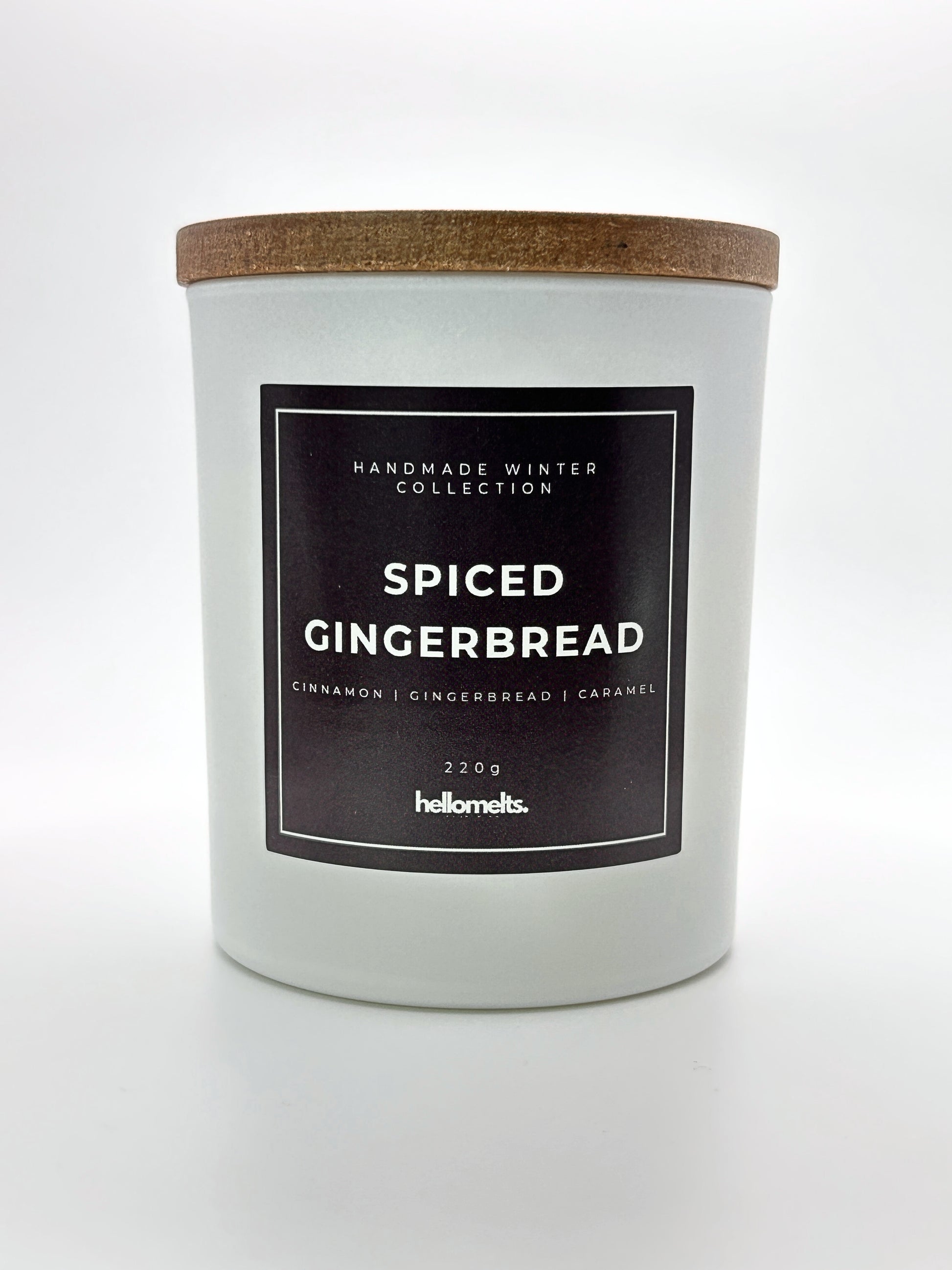 Spiced Gingerbread 220g candle front-facing studio shot with wooden lid on, part of the Hellomelts Winter Collection