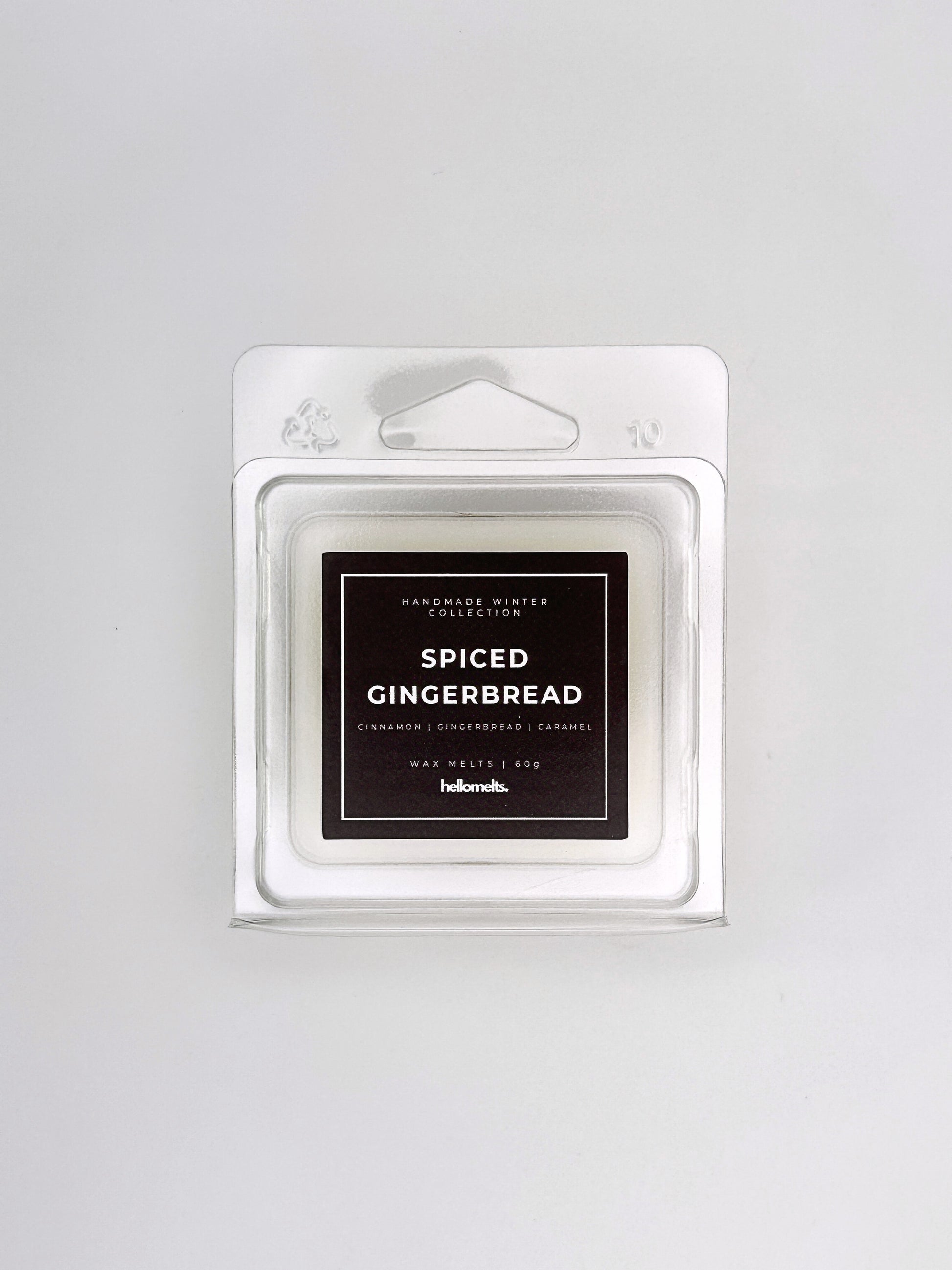 Spiced Gingerbread 60g wax melt front-facing studio shot showing the clamshell packaging from the Hellomelts Winter Collection