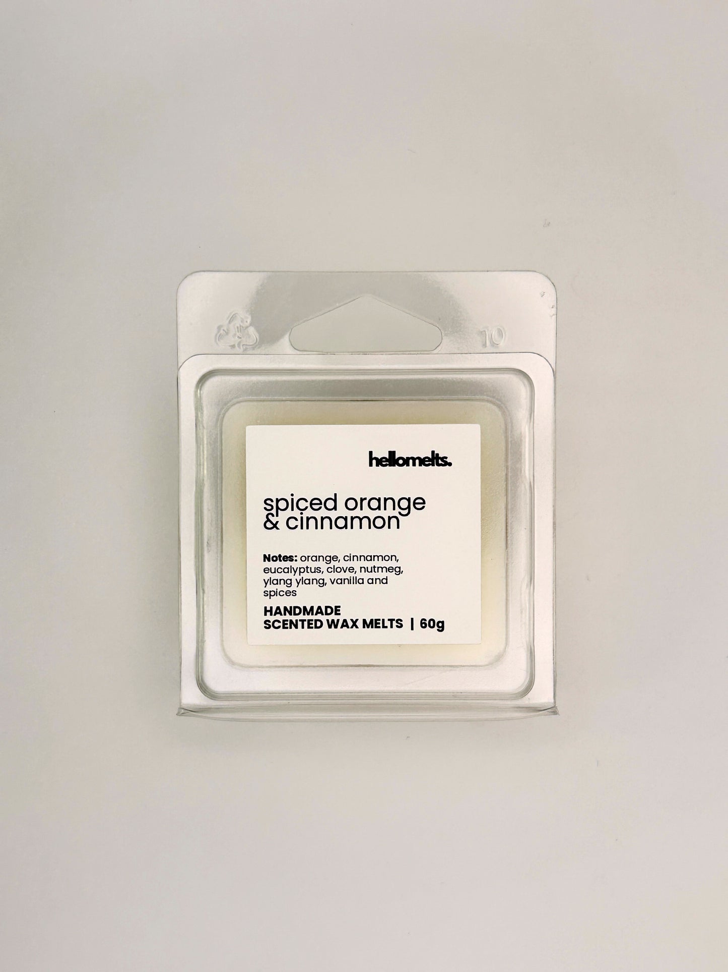 Front view of Spiced Orange & Cinnamon 60g wax melt in clear clamshell packaging from the Hellomelts Autumn Collection