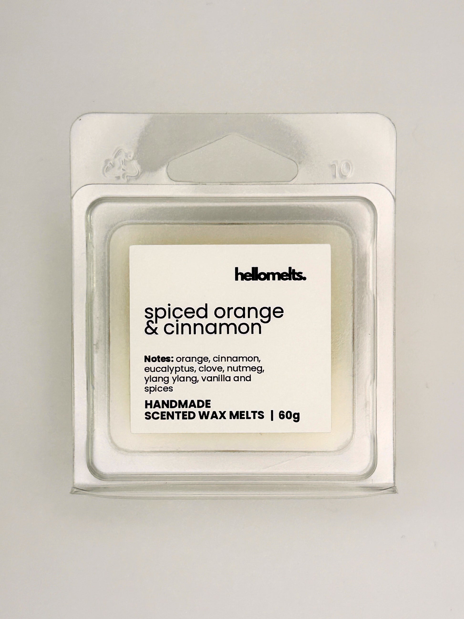 Front view of Spiced Orange & Cinnamon 60g wax melt in clear clamshell packaging from the Hellomelts Autumn Collection