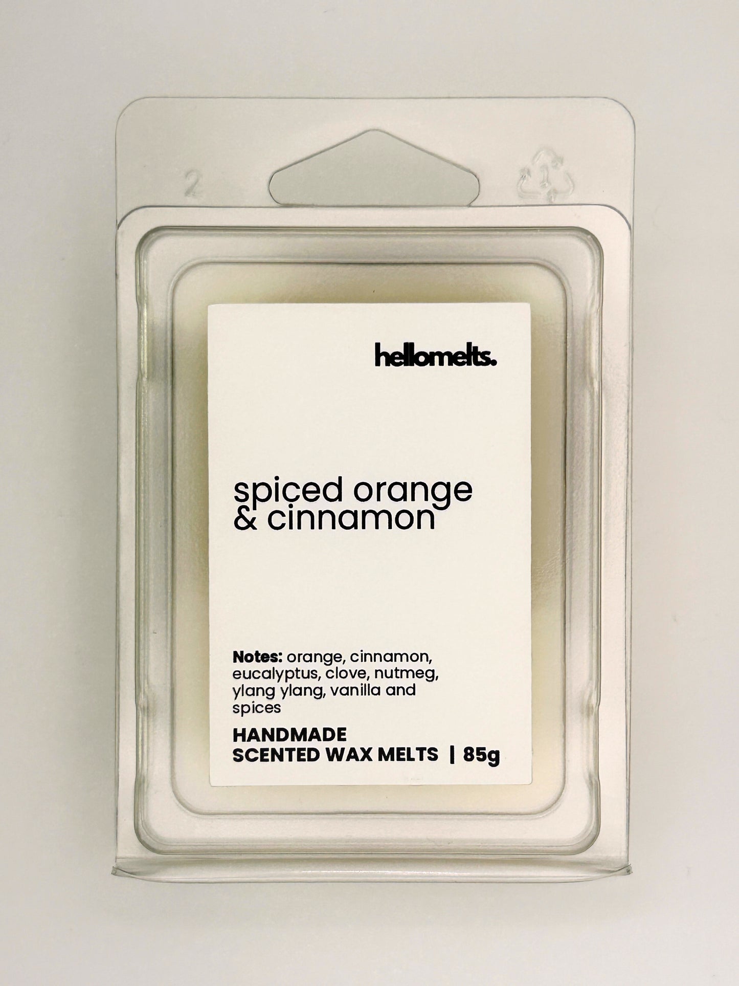 Close up of Spiced Orange & Cinnamon 85g wax melt label on clear clamshell packaging from the Hellomelts Autumn Collection