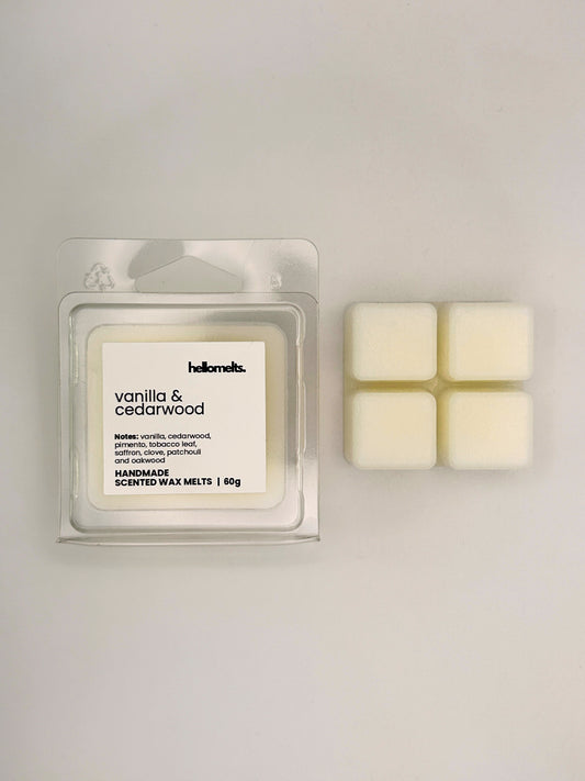 Vanilla & Cedarwood 60g wax melt bar displayed beside its clear clamshell packaging from the Hellomelts Autumn Collection