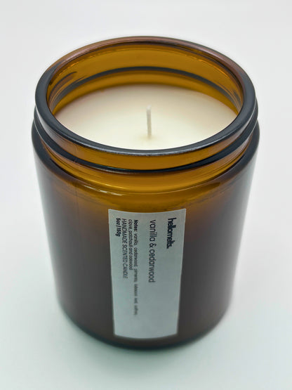 Angled top-down view of Vanilla & Cedarwood autumn candle by Hellomelts, highlighting the wick and hand-poured wax, part of the Autumn Collection