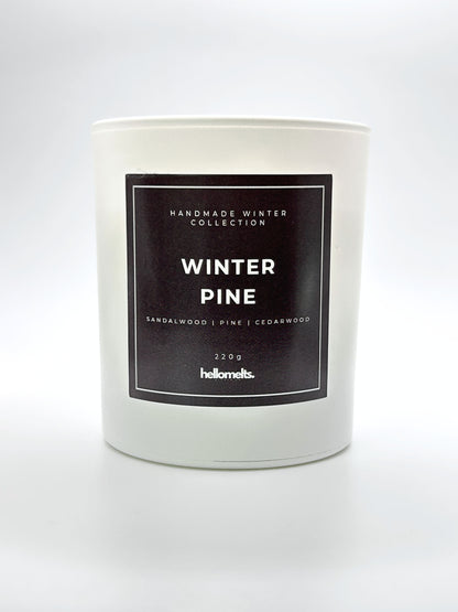 Winter Pine 220g candle front-facing studio shot without the lid, showing the clean white jar and label from the Hellomelts Winter Collection